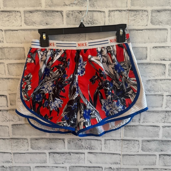Women’s Nike Dri-fit Orange blue and white floral print lined athletic shorts M - Picture 1 of 4